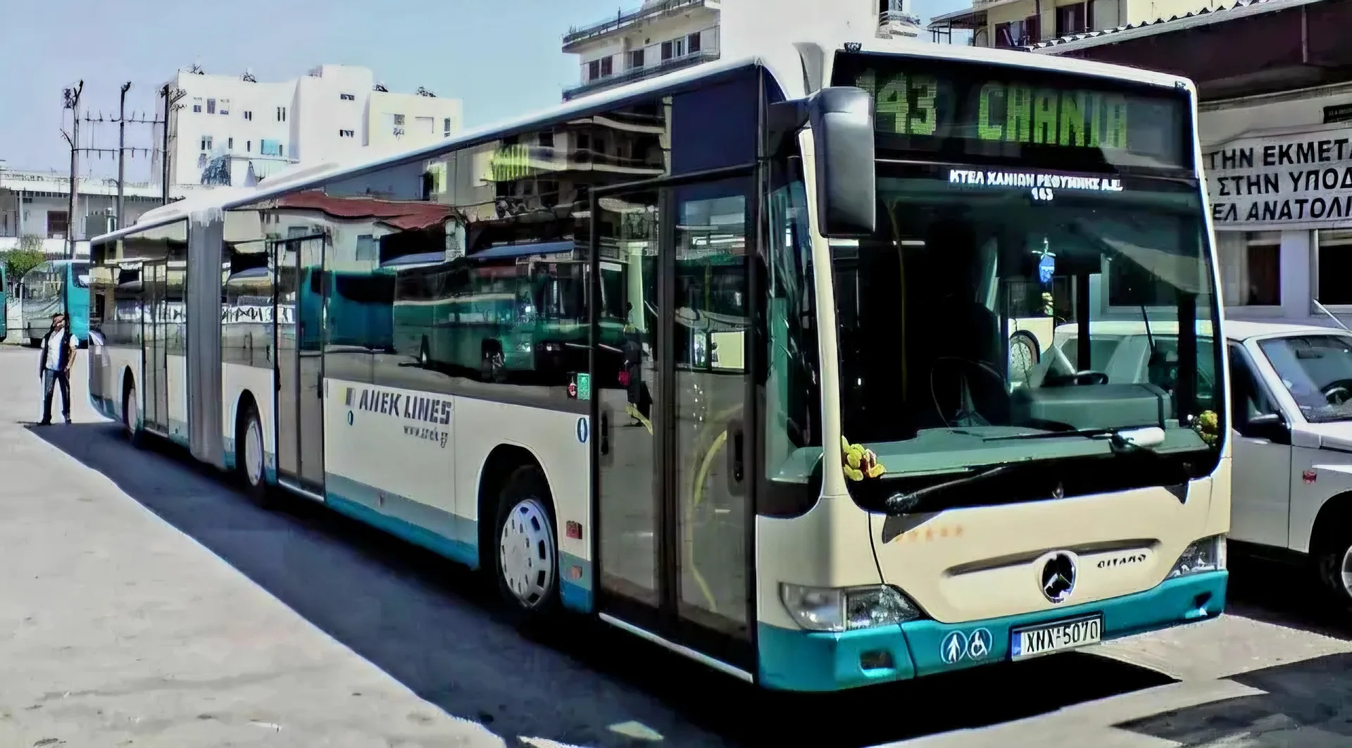 An articulated KTEL Chania-Rethymno bus at the stand, destination « 43 CHANIA »