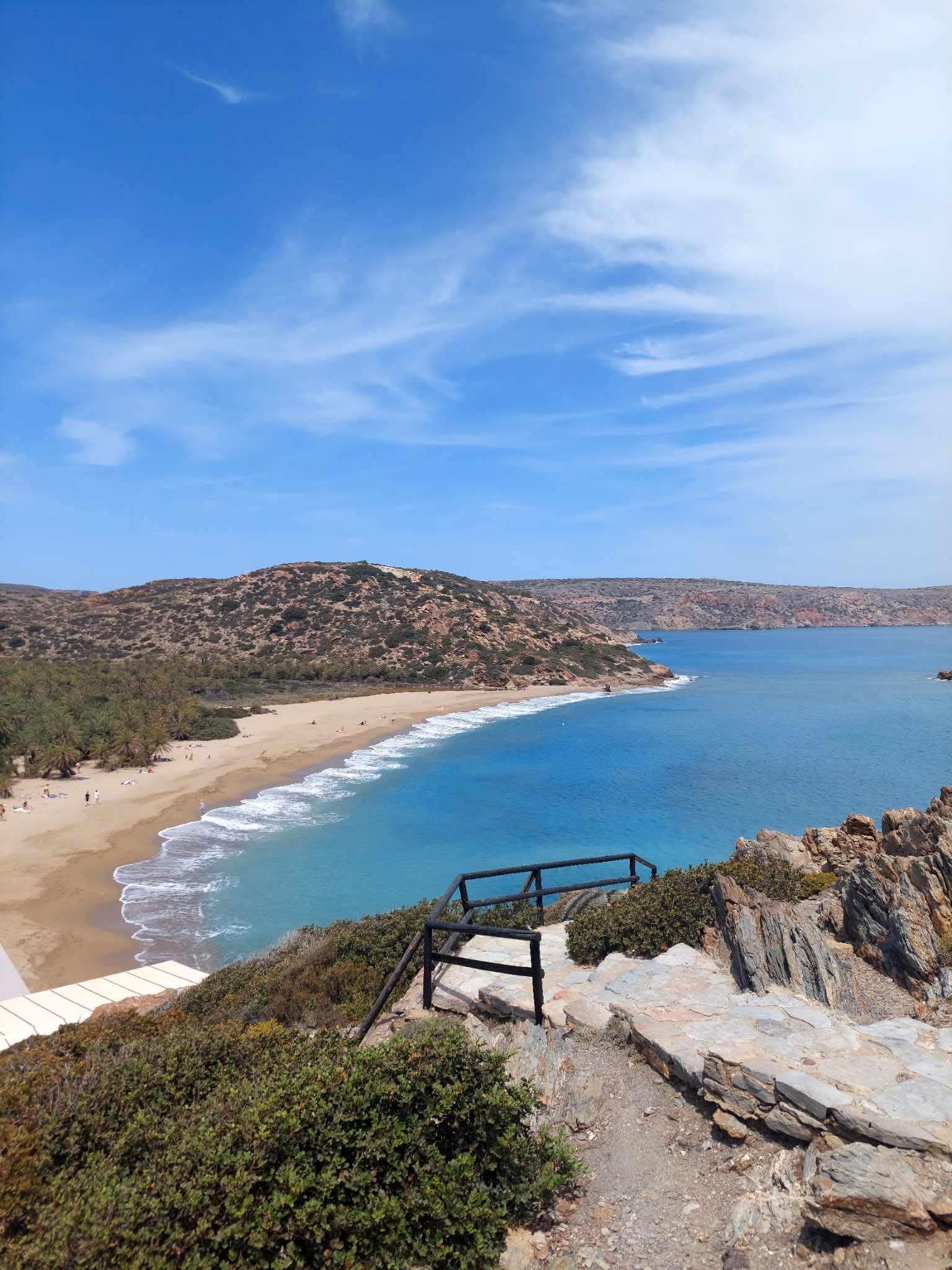 Vai beach from the viewpoint: palm forest, golden sand and turquoise bay, far east of Crete