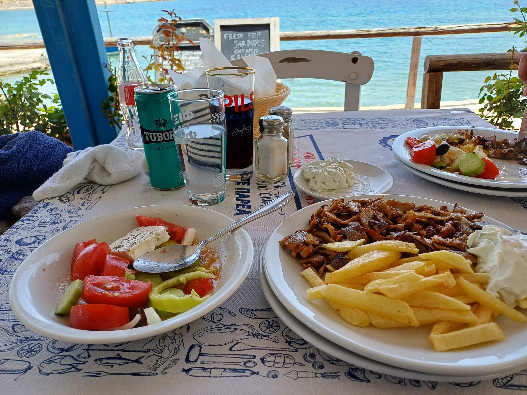 Mochlos — The catch of the day, feet in the water